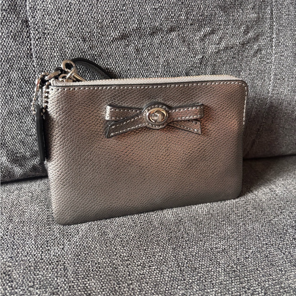 Coach Metallic Silver Bow Turn lock Wristlet